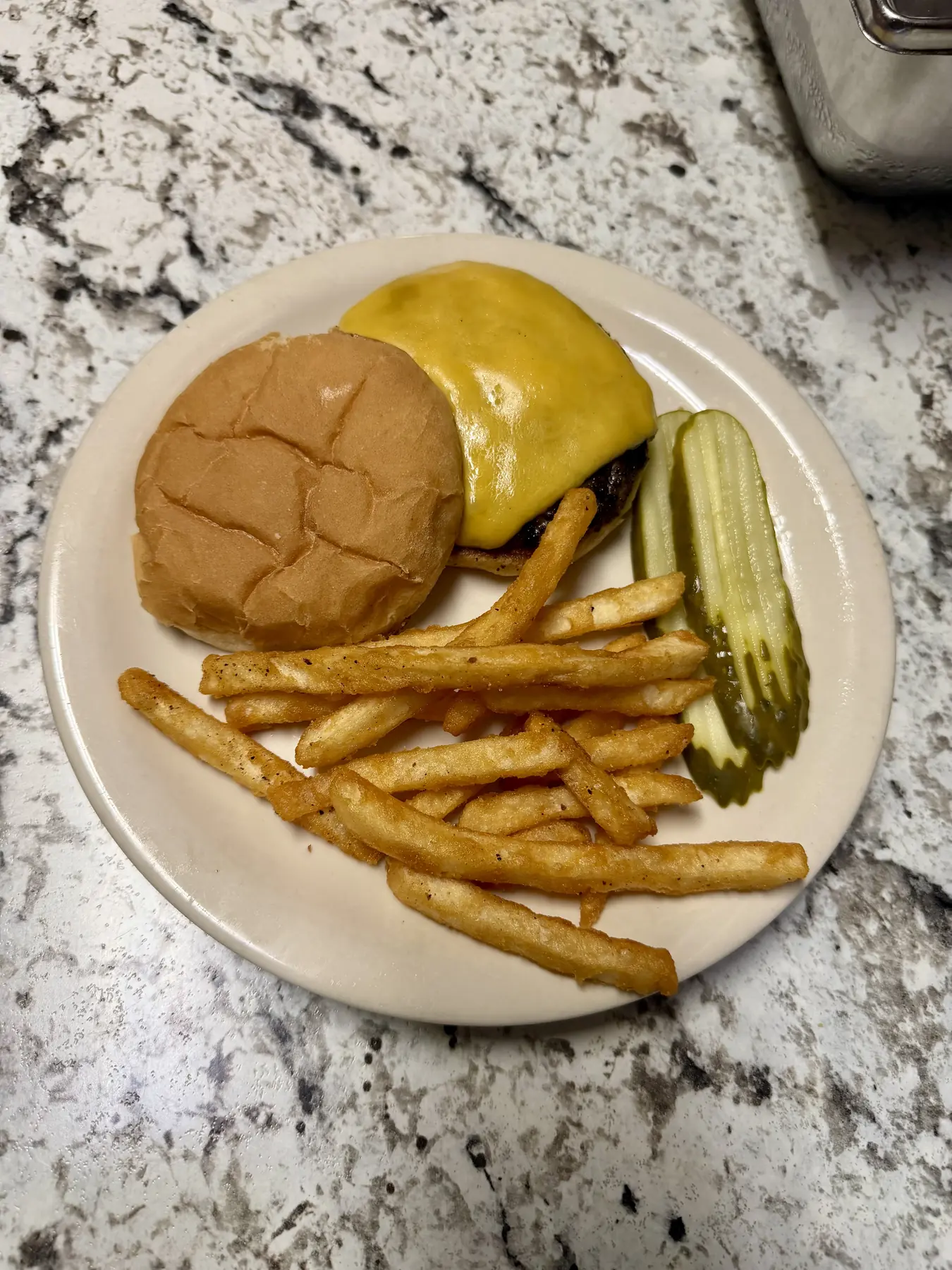 A junior cheeseburger with fries