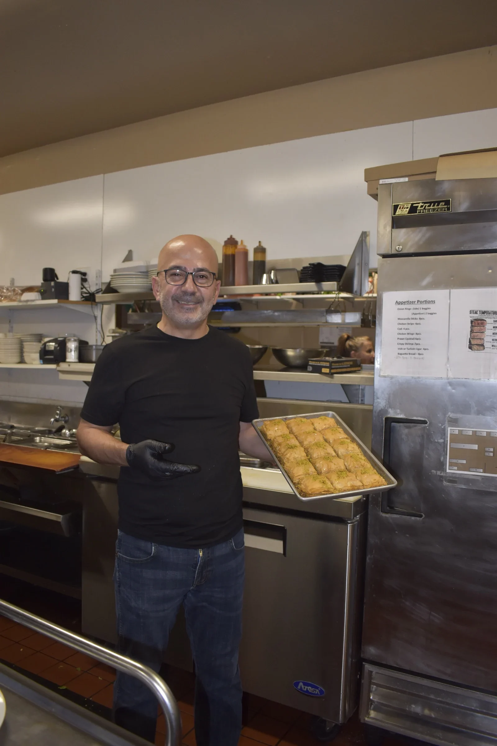 Owner Halil Demir in the kitchen